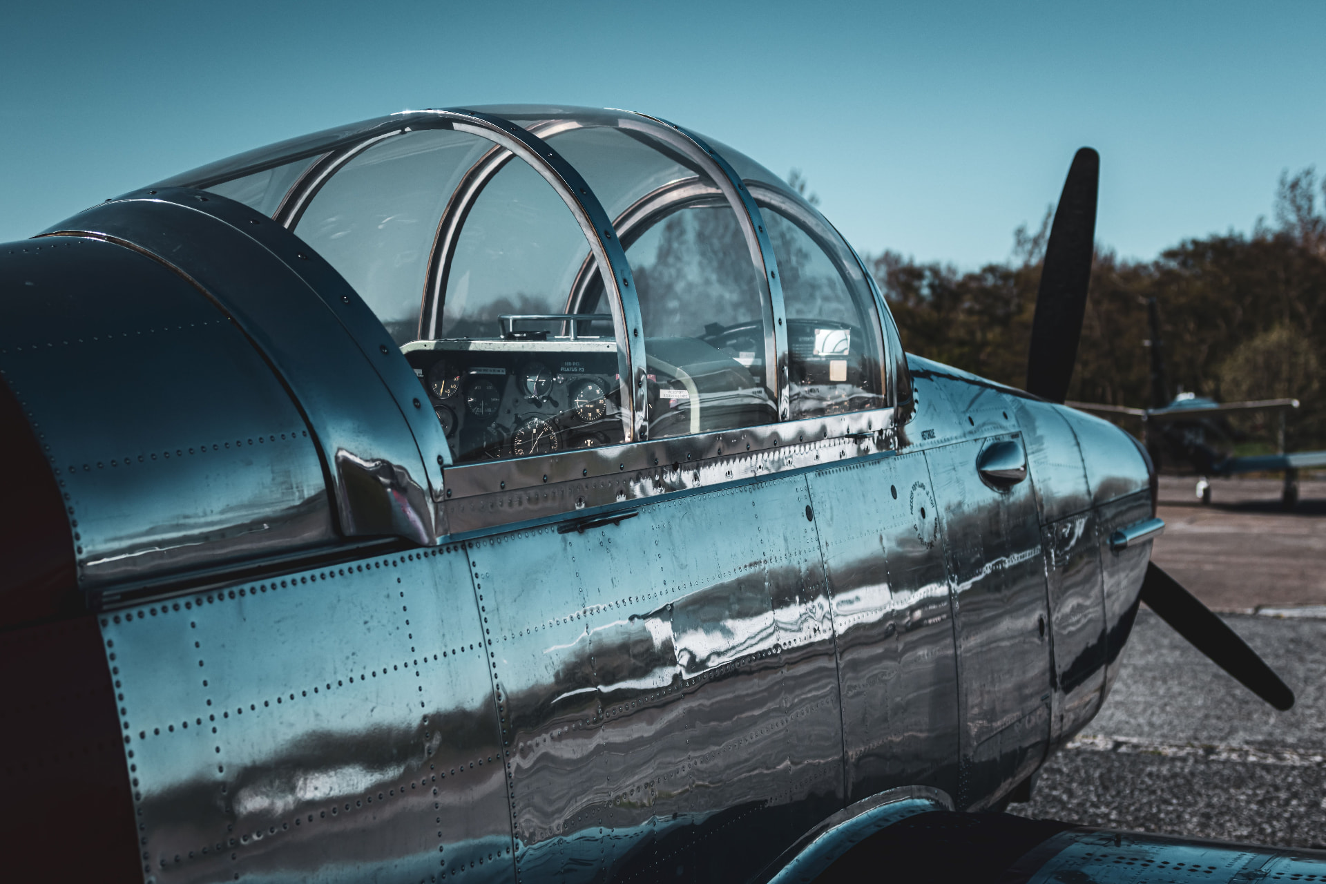 Polished vintage aircraft cockpit and fuselage